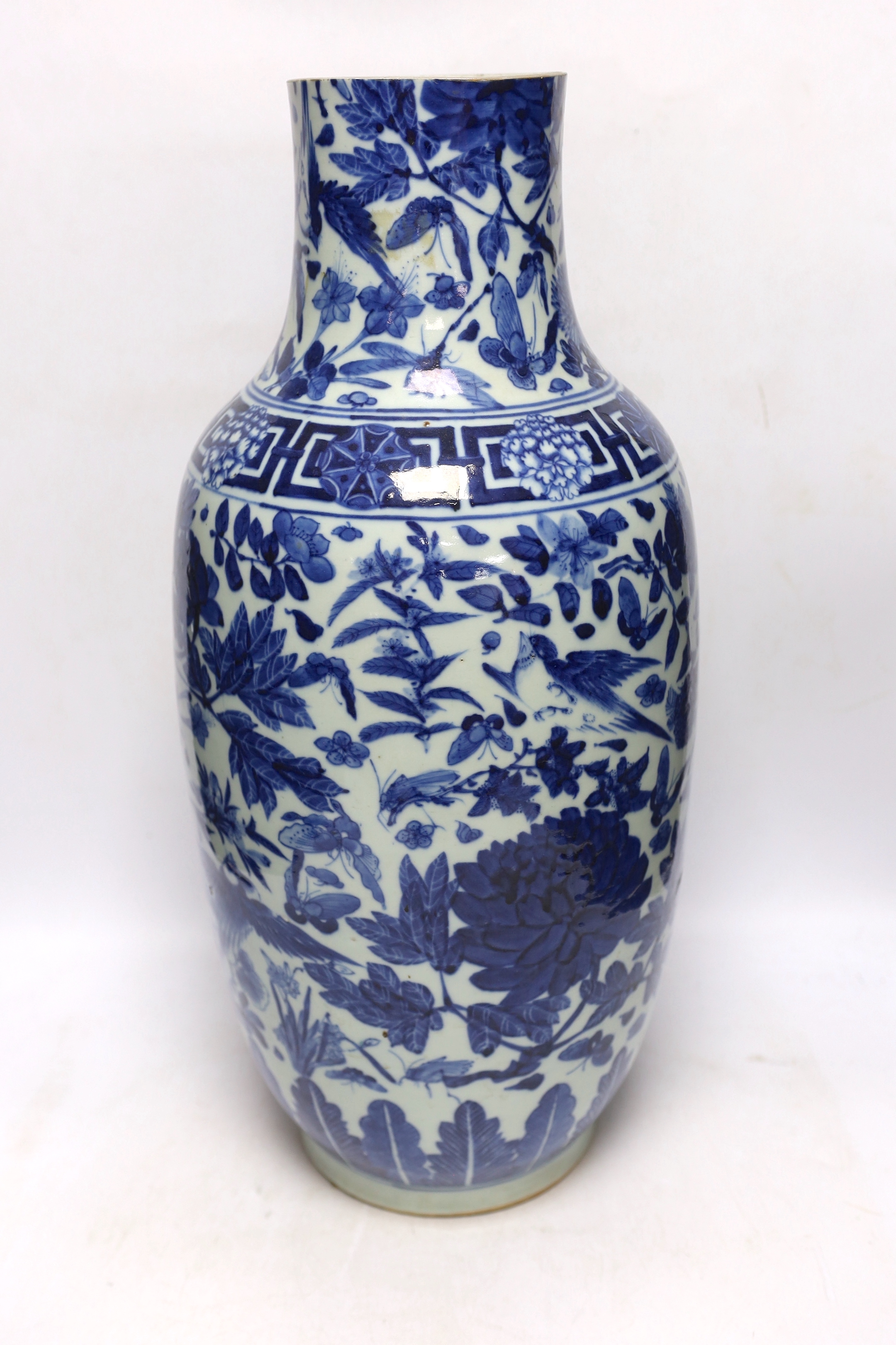A large Chinese blue and white ‘birds amid foliage’ vase, late 19th century, 54cm